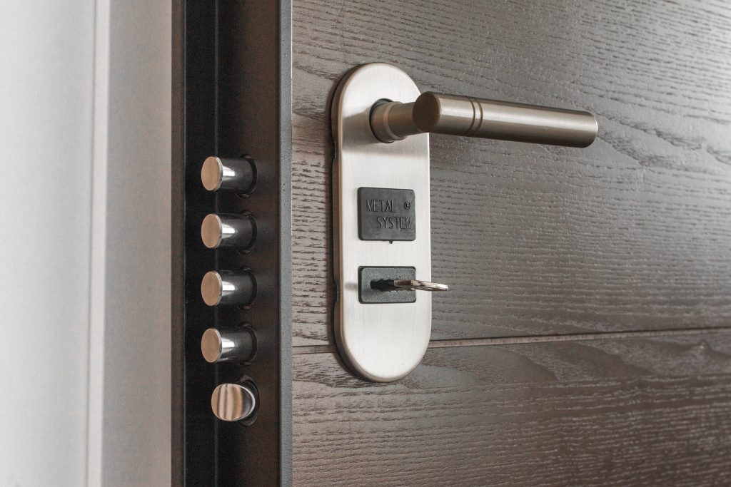 An open, high-tech door knob signifying security that has been opened.